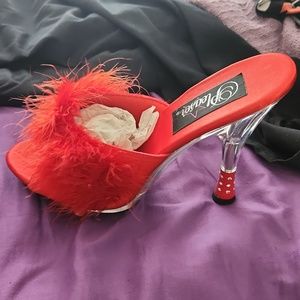 Red satin heals with feather and gem stone accent